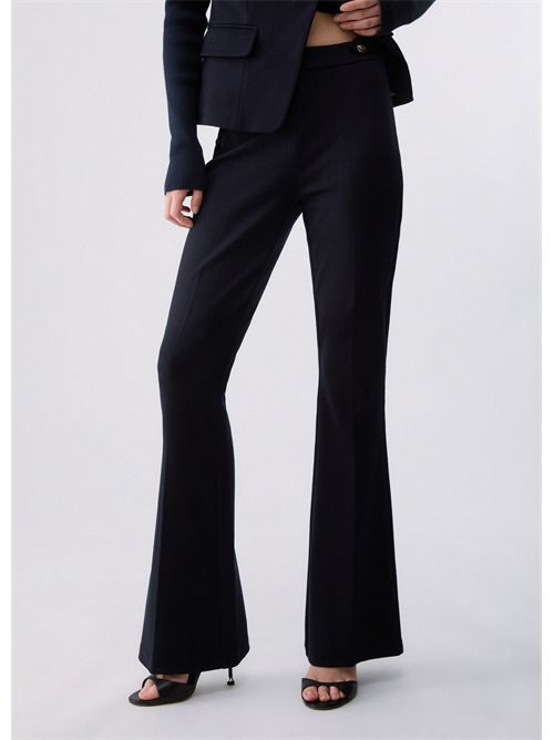 Pantaloni flare in punto milano